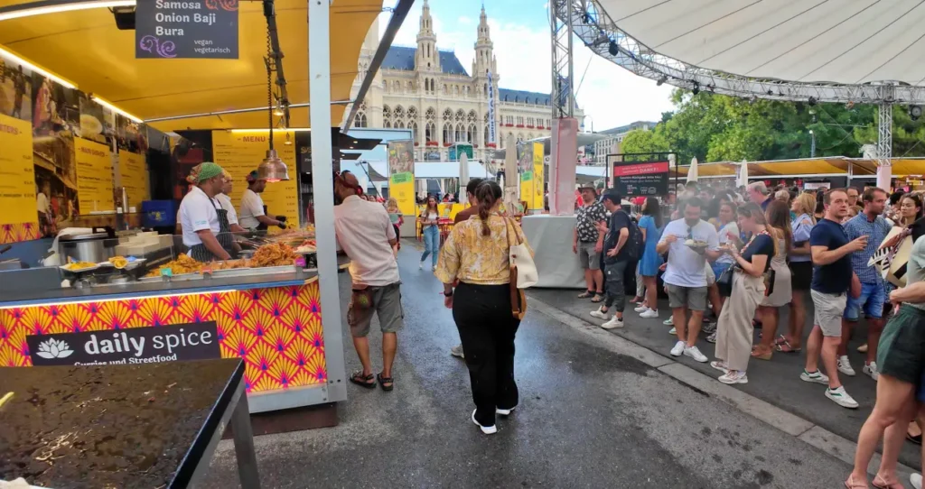 rathouse garden people having fun during a festival and vendors 